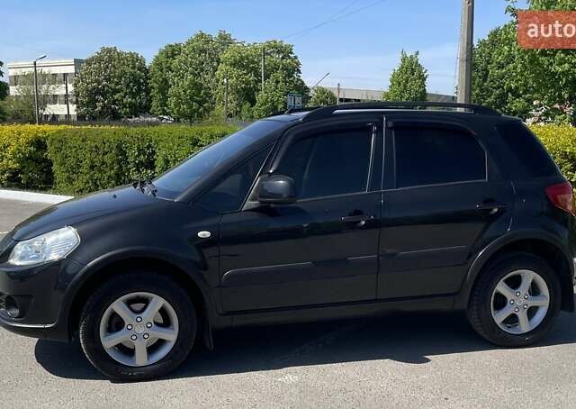 Черный Сузуки СХ4, объемом двигателя 1.6 л и пробегом 204 тыс. км за 6550 $, фото 6 на Automoto.ua