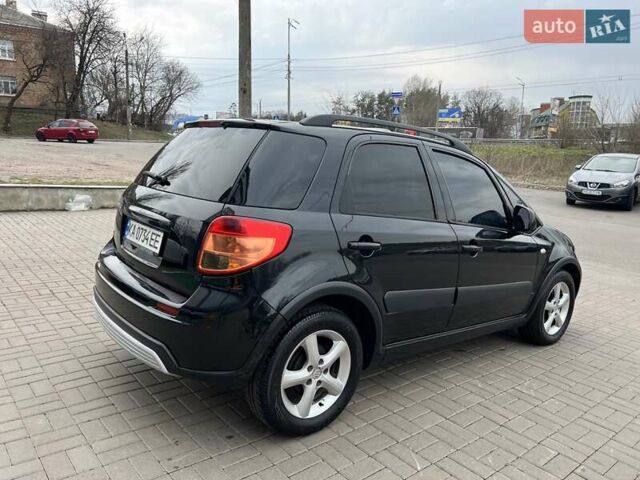 Черный Сузуки СХ4, объемом двигателя 1.59 л и пробегом 155 тыс. км за 7500 $, фото 3 на Automoto.ua