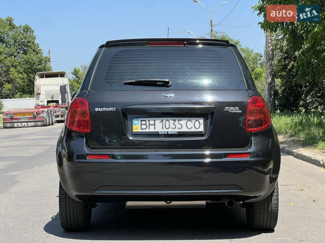 Черный Сузуки СХ4, объемом двигателя 1.6 л и пробегом 196 тыс. км за 5499 $, фото 3 на Automoto.ua
