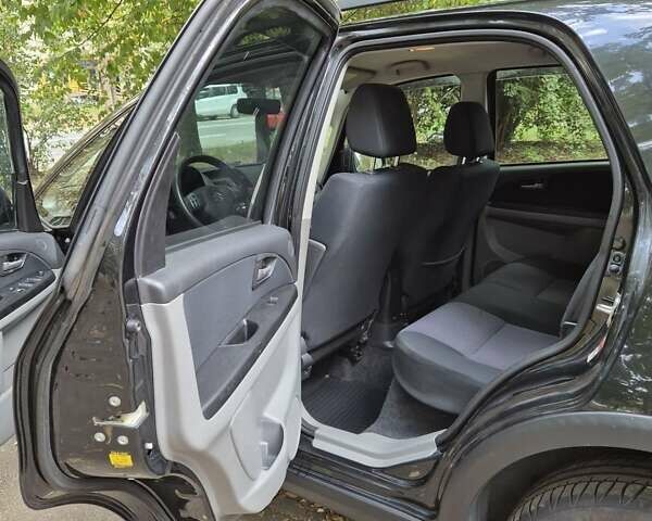 Черный Сузуки СХ4, объемом двигателя 1.6 л и пробегом 137 тыс. км за 8000 $, фото 3 на Automoto.ua