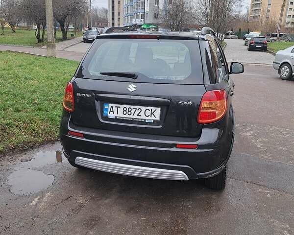 Чорний Сузукі СХ4, об'ємом двигуна 1.59 л та пробігом 265 тис. км за 6500 $, фото 4 на Automoto.ua