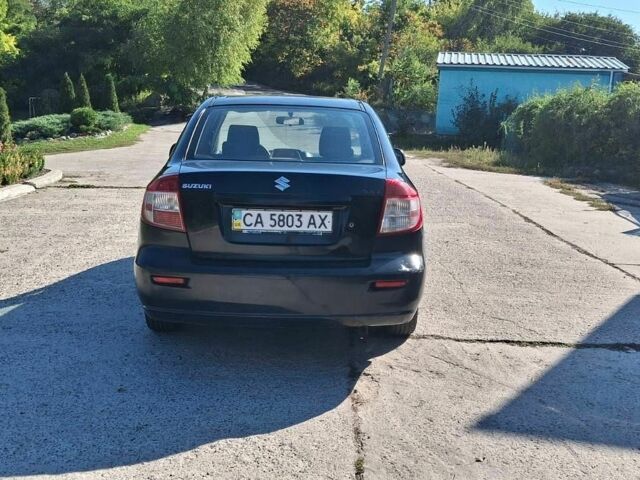 Чорний Сузукі СХ4, об'ємом двигуна 1.59 л та пробігом 225 тис. км за 2650 $, фото 7 на Automoto.ua