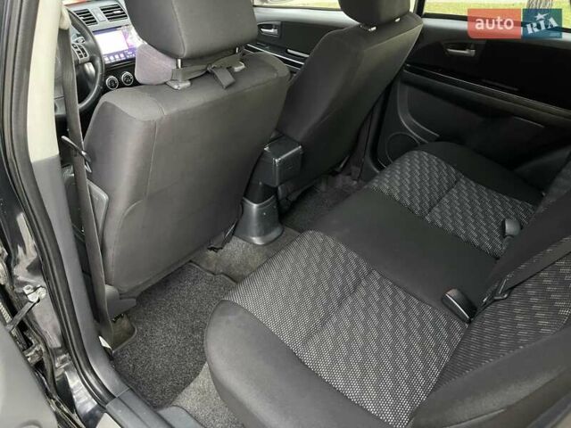 Черный Сузуки СХ4, объемом двигателя 2 л и пробегом 164 тыс. км за 7999 $, фото 17 на Automoto.ua