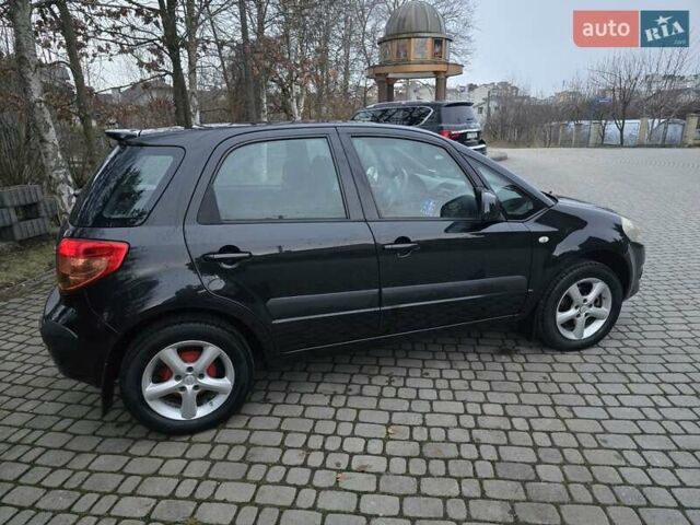 Черный Сузуки СХ4, объемом двигателя 1.6 л и пробегом 178 тыс. км за 5700 $, фото 4 на Automoto.ua