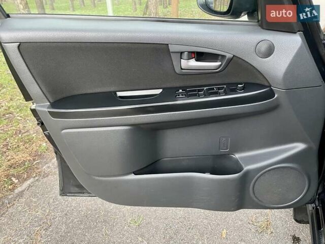 Черный Сузуки СХ4, объемом двигателя 2 л и пробегом 164 тыс. км за 7999 $, фото 27 на Automoto.ua