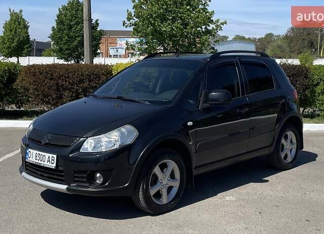 Черный Сузуки СХ4, объемом двигателя 1.6 л и пробегом 204 тыс. км за 6550 $, фото 5 на Automoto.ua