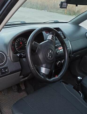 Чорний Сузукі СХ4, об'ємом двигуна 1.6 л та пробігом 208 тис. км за 7500 $, фото 3 на Automoto.ua