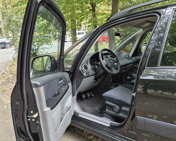 Черный Сузуки СХ4, объемом двигателя 1.6 л и пробегом 137 тыс. км за 8000 $, фото 15 на Automoto.ua