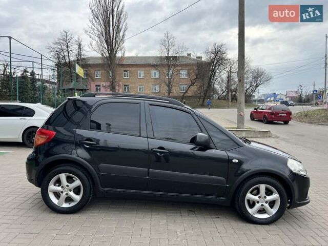 Черный Сузуки СХ4, объемом двигателя 1.59 л и пробегом 155 тыс. км за 7500 $, фото 2 на Automoto.ua