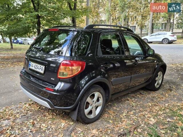 Черный Сузуки СХ4, объемом двигателя 1.6 л и пробегом 137 тыс. км за 8000 $, фото 4 на Automoto.ua
