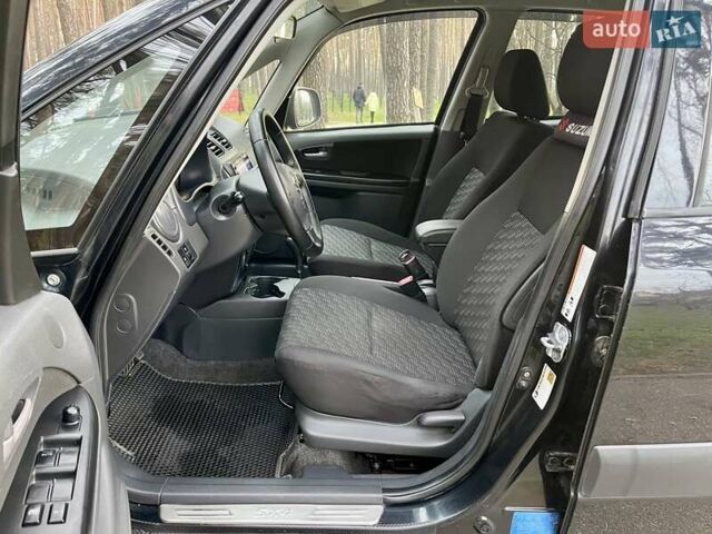 Черный Сузуки СХ4, объемом двигателя 2 л и пробегом 164 тыс. км за 7999 $, фото 12 на Automoto.ua