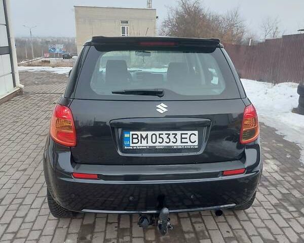 Черный Сузуки СХ4, объемом двигателя 1.91 л и пробегом 212 тыс. км за 5300 $, фото 3 на Automoto.ua