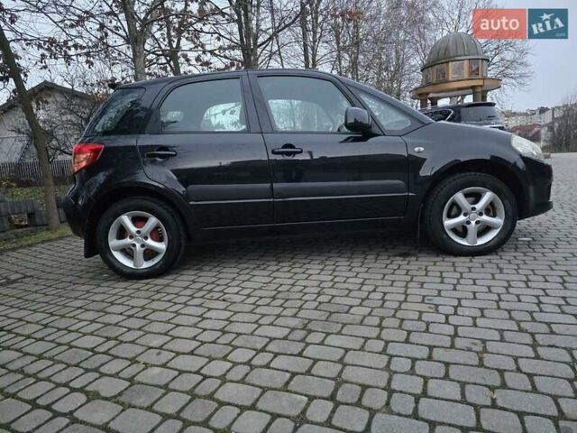 Черный Сузуки СХ4, объемом двигателя 1.6 л и пробегом 178 тыс. км за 5700 $, фото 13 на Automoto.ua