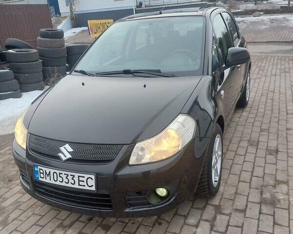 Черный Сузуки СХ4, объемом двигателя 1.91 л и пробегом 212 тыс. км за 5300 $, фото 1 на Automoto.ua