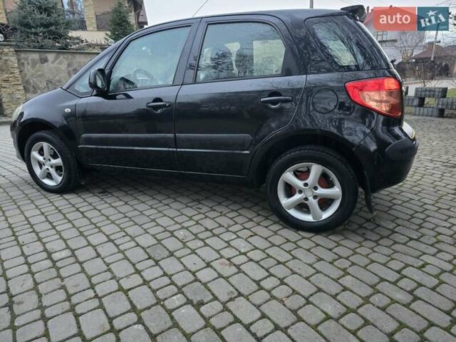 Черный Сузуки СХ4, объемом двигателя 1.6 л и пробегом 178 тыс. км за 5700 $, фото 26 на Automoto.ua