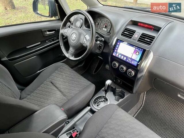 Черный Сузуки СХ4, объемом двигателя 2 л и пробегом 164 тыс. км за 7999 $, фото 15 на Automoto.ua