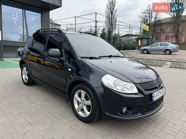 Черный Сузуки СХ4, объемом двигателя 1.59 л и пробегом 155 тыс. км за 7500 $, фото 1 на Automoto.ua