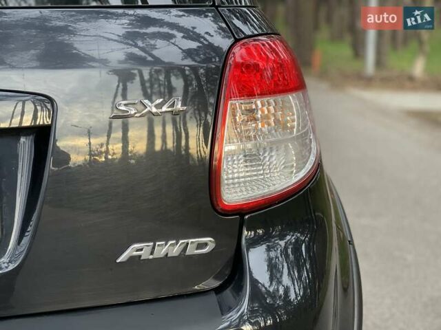 Черный Сузуки СХ4, объемом двигателя 2 л и пробегом 164 тыс. км за 7999 $, фото 4 на Automoto.ua