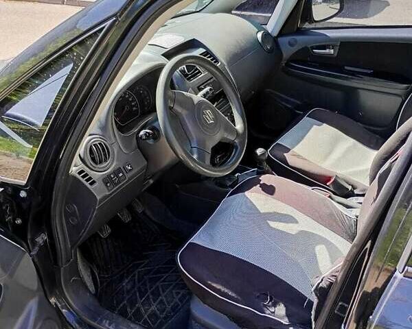 Черный Сузуки СХ4, объемом двигателя 1.6 л и пробегом 185 тыс. км за 6200 $, фото 5 на Automoto.ua