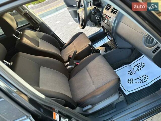 Чорний Сузукі СХ4, об'ємом двигуна 1.59 л та пробігом 240 тис. км за 5100 $, фото 20 на Automoto.ua