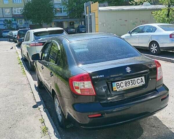 Черный Сузуки СХ4, объемом двигателя 1.6 л и пробегом 185 тыс. км за 6200 $, фото 4 на Automoto.ua