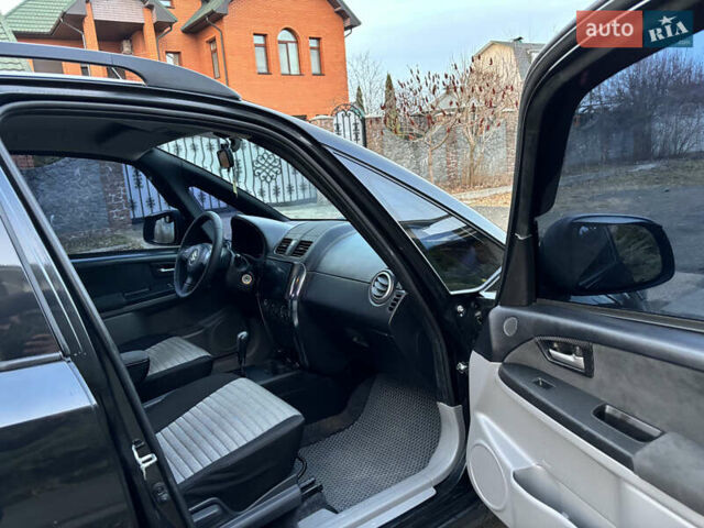 Черный Сузуки СХ4, объемом двигателя 1.59 л и пробегом 147 тыс. км за 8999 $, фото 20 на Automoto.ua