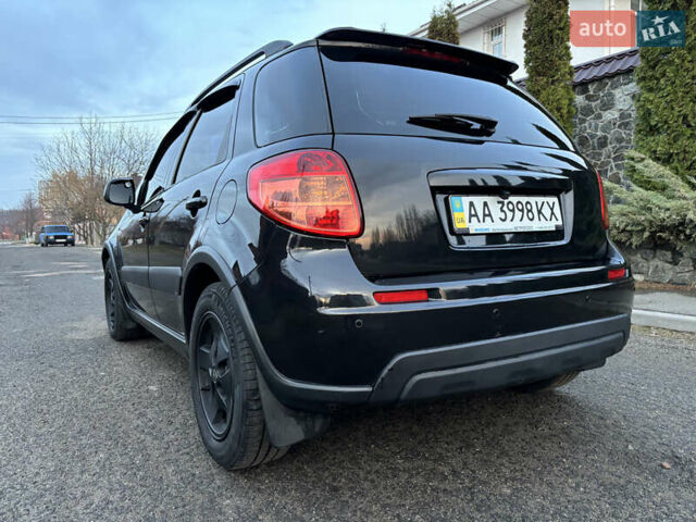 Черный Сузуки СХ4, объемом двигателя 1.59 л и пробегом 147 тыс. км за 8999 $, фото 12 на Automoto.ua