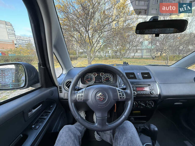 Чорний Сузукі СХ4, об'ємом двигуна 2 л та пробігом 148 тис. км за 7000 $, фото 19 на Automoto.ua