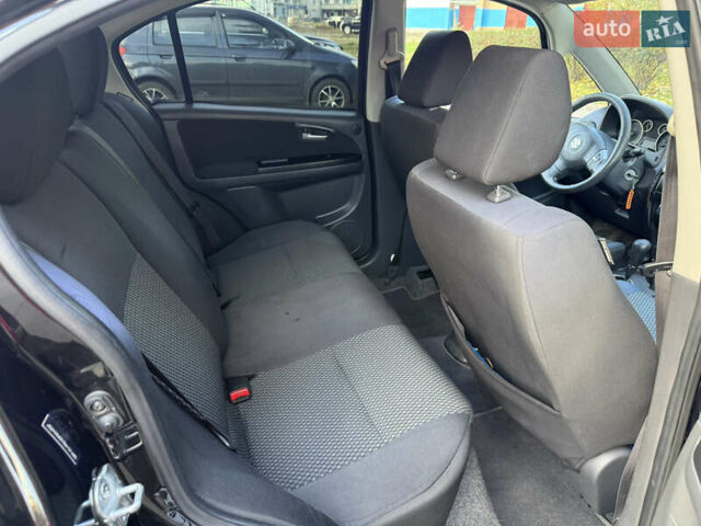 Чорний Сузукі СХ4, об'ємом двигуна 2 л та пробігом 148 тис. км за 7000 $, фото 31 на Automoto.ua