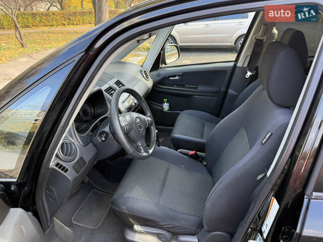 Чорний Сузукі СХ4, об'ємом двигуна 2 л та пробігом 148 тис. км за 7000 $, фото 43 на Automoto.ua