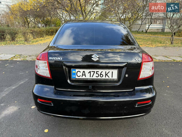 Черный Сузуки СХ4, объемом двигателя 2 л и пробегом 240 тыс. км за 8500 $, фото 3 на Automoto.ua