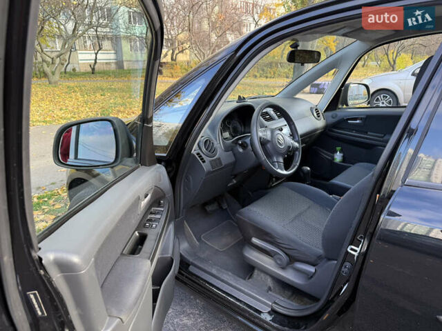 Черный Сузуки СХ4, объемом двигателя 2 л и пробегом 240 тыс. км за 8500 $, фото 44 на Automoto.ua
