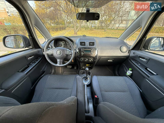 Чорний Сузукі СХ4, об'ємом двигуна 2 л та пробігом 148 тис. км за 7000 $, фото 13 на Automoto.ua