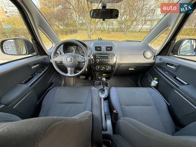 Черный Сузуки СХ4, объемом двигателя 2 л и пробегом 240 тыс. км за 8500 $, фото 11 на Automoto.ua