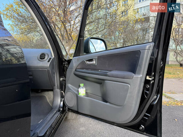 Черный Сузуки СХ4, объемом двигателя 2 л и пробегом 240 тыс. км за 8500 $, фото 40 на Automoto.ua