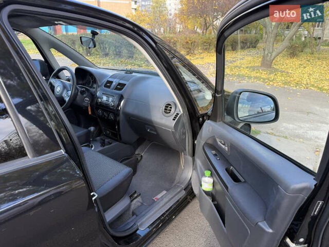 Чорний Сузукі СХ4, об'ємом двигуна 2 л та пробігом 148 тис. км за 7000 $, фото 42 на Automoto.ua