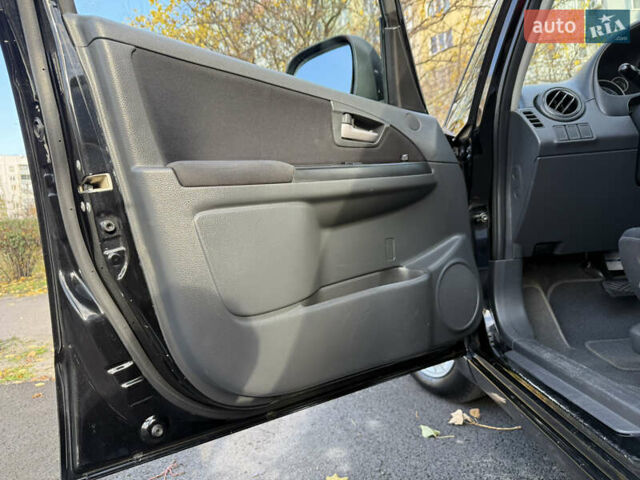 Черный Сузуки СХ4, объемом двигателя 2 л и пробегом 240 тыс. км за 8500 $, фото 43 на Automoto.ua