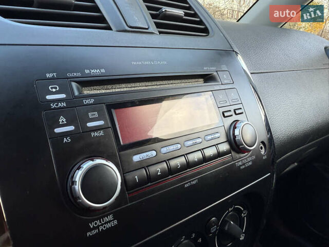 Чорний Сузукі СХ4, об'ємом двигуна 2 л та пробігом 148 тис. км за 7000 $, фото 17 на Automoto.ua