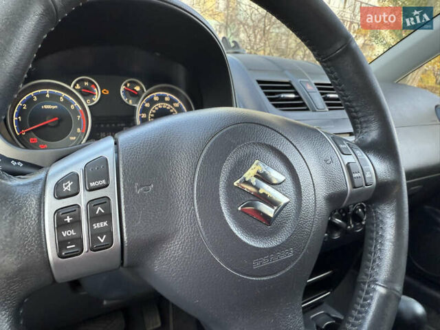 Черный Сузуки СХ4, объемом двигателя 2 л и пробегом 240 тыс. км за 8500 $, фото 22 на Automoto.ua