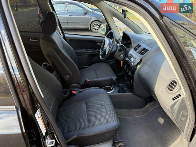 Чорний Сузукі СХ4, об'ємом двигуна 2 л та пробігом 148 тис. км за 7000 $, фото 40 на Automoto.ua