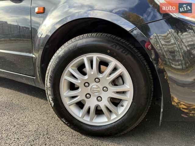 Черный Сузуки СХ4, объемом двигателя 2 л и пробегом 240 тыс. км за 8500 $, фото 45 на Automoto.ua