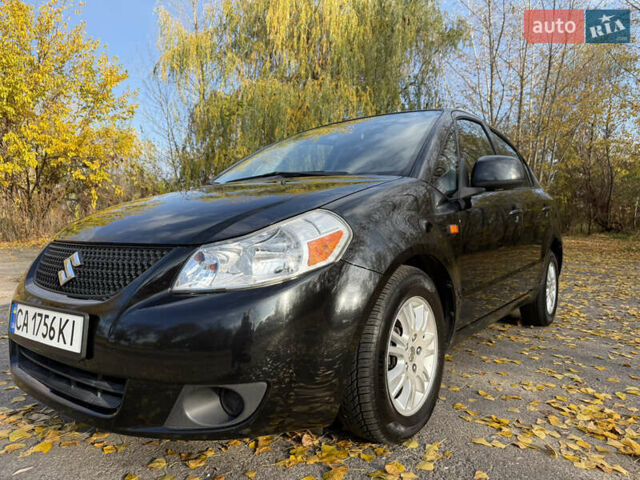 Чорний Сузукі СХ4, об'ємом двигуна 2 л та пробігом 148 тис. км за 7000 $, фото 2 на Automoto.ua