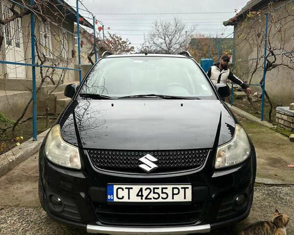 Черный Сузуки СХ4, объемом двигателя 1.6 л и пробегом 196 тыс. км за 3900 $, фото 2 на Automoto.ua