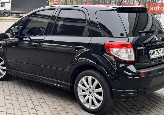 Чорний Сузукі СХ4, об'ємом двигуна 2 л та пробігом 240 тис. км за 6950 $, фото 4 на Automoto.ua