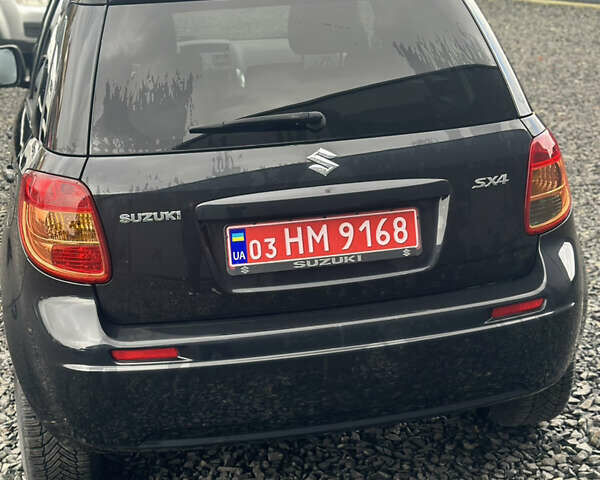 Черный Сузуки СХ4, объемом двигателя 1.6 л и пробегом 195 тыс. км за 7990 $, фото 4 на Automoto.ua