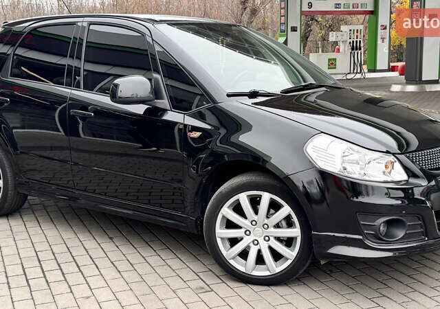 Чорний Сузукі СХ4, об'ємом двигуна 2 л та пробігом 240 тис. км за 6950 $, фото 13 на Automoto.ua