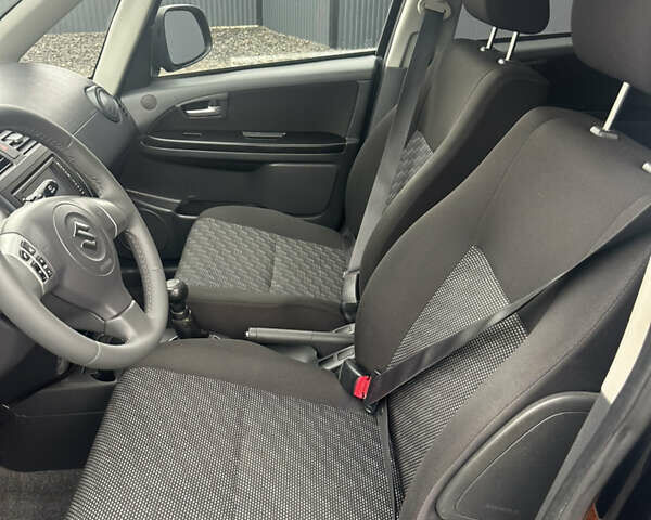 Черный Сузуки СХ4, объемом двигателя 1.6 л и пробегом 195 тыс. км за 7990 $, фото 8 на Automoto.ua