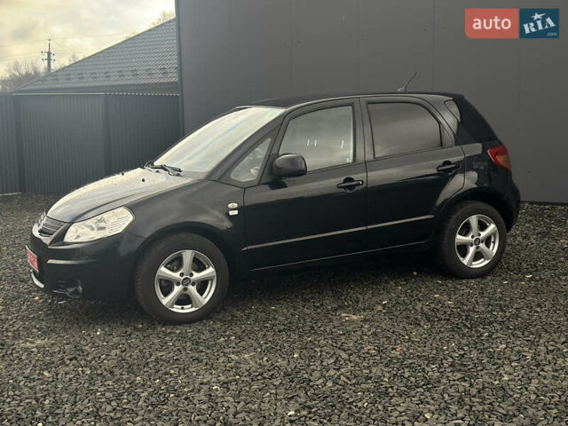 Черный Сузуки СХ4, объемом двигателя 1.6 л и пробегом 195 тыс. км за 7990 $, фото 1 на Automoto.ua