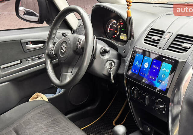 Чорний Сузукі СХ4, об'ємом двигуна 2 л та пробігом 240 тис. км за 6950 $, фото 20 на Automoto.ua