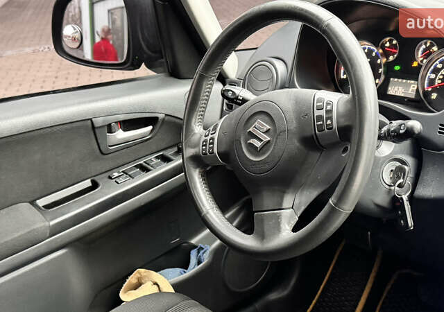 Чорний Сузукі СХ4, об'ємом двигуна 2 л та пробігом 240 тис. км за 6950 $, фото 21 на Automoto.ua